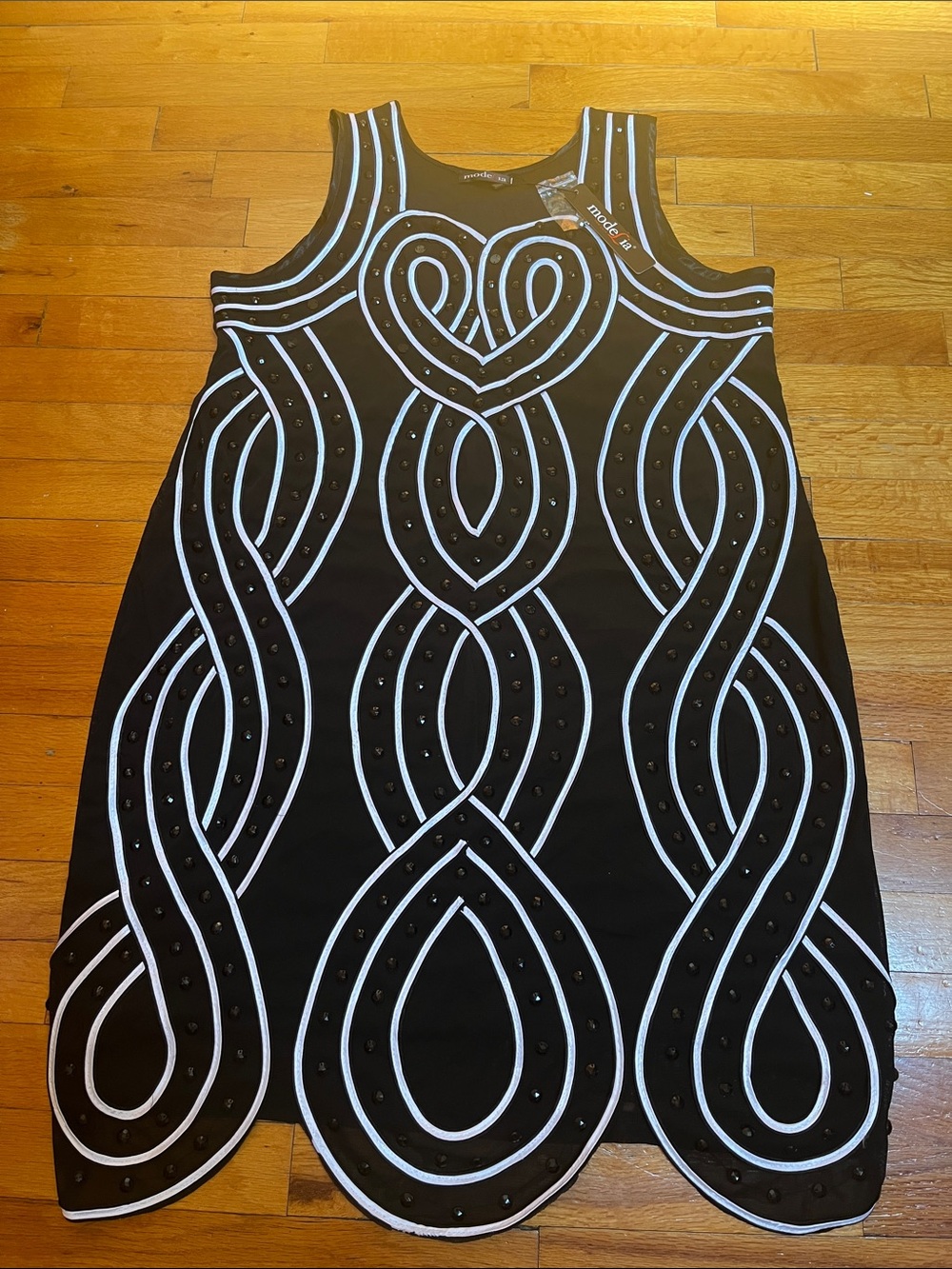 Sleeveless Black Mini Dress with White Piping and Stud Detail